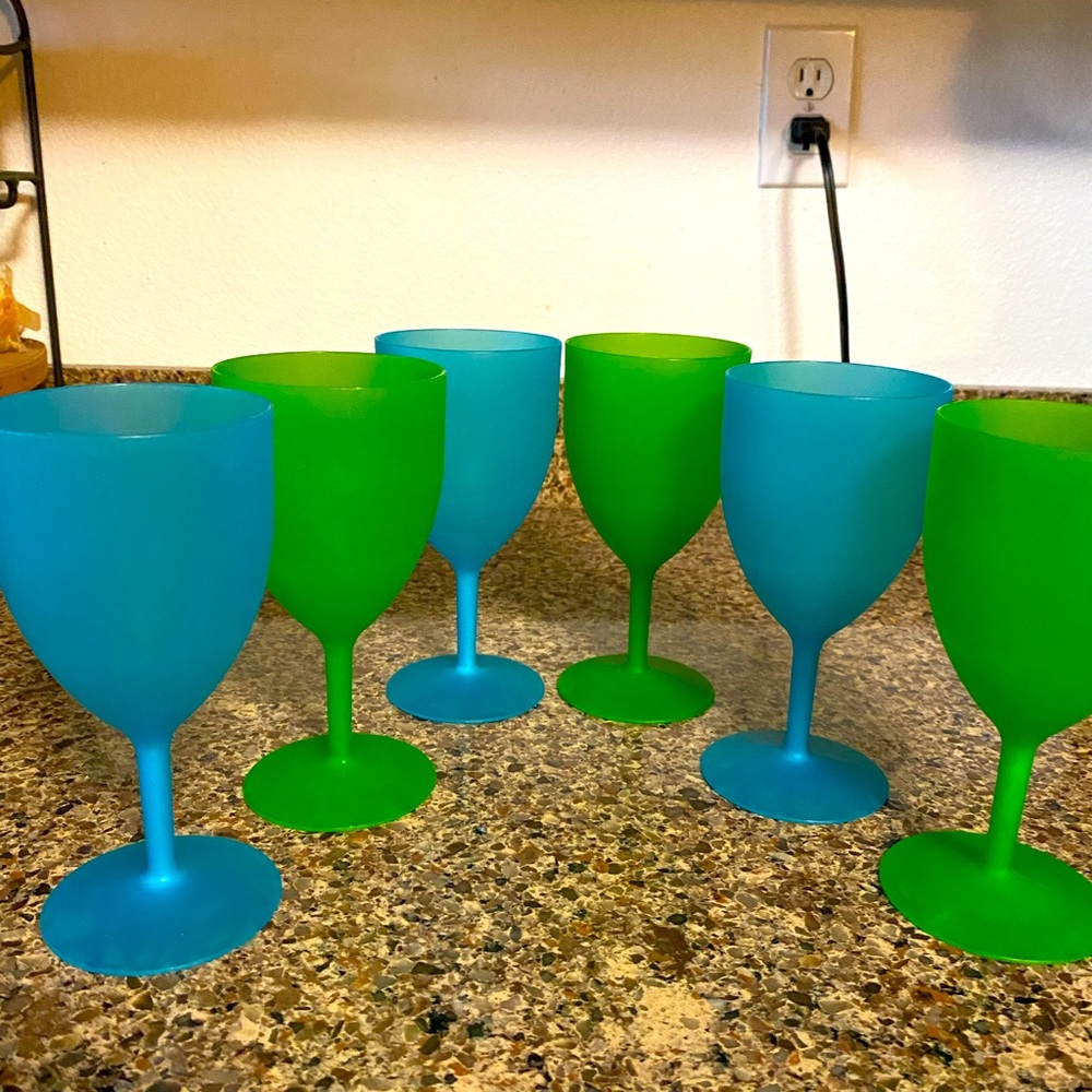 Six colorful blue and green plastic wine glasses great for poolside.   7 inches